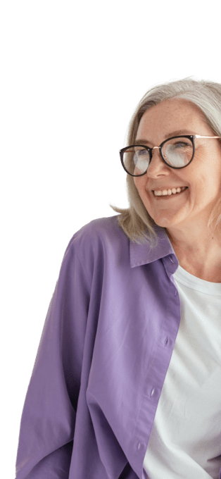 women in purple button down smiling in glasses