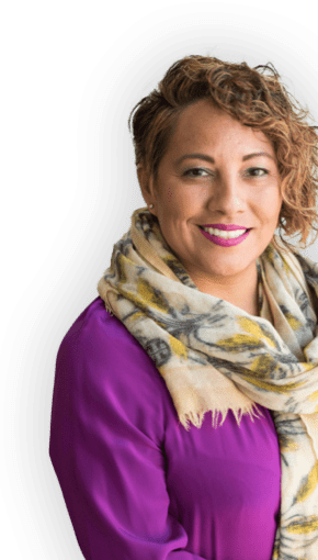 smiling women in purple shirt and multicolor scarf