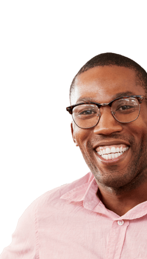 guy in salmon collard shirt smiling with glasses